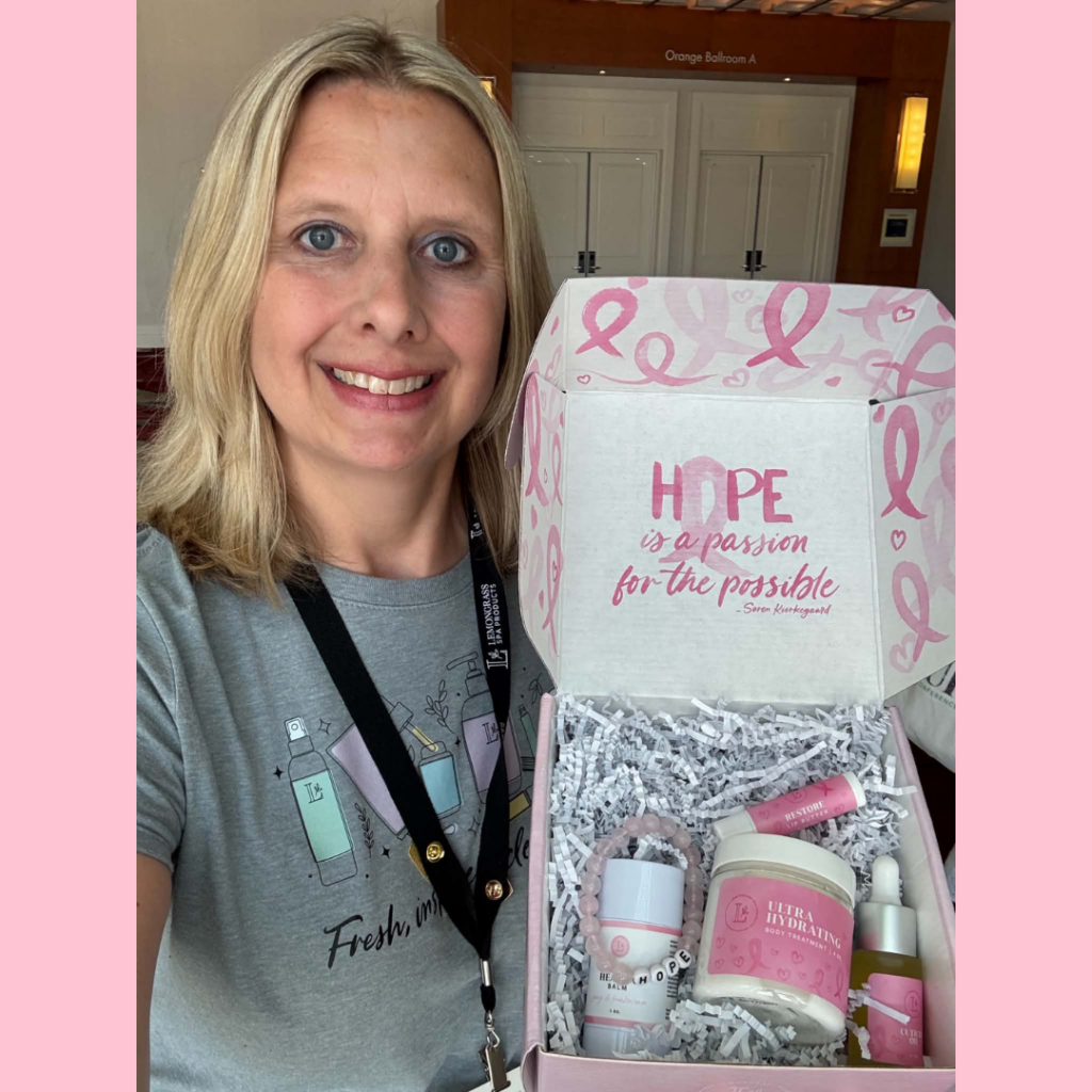 Jenny holding the 2026 Pink Box of Hope